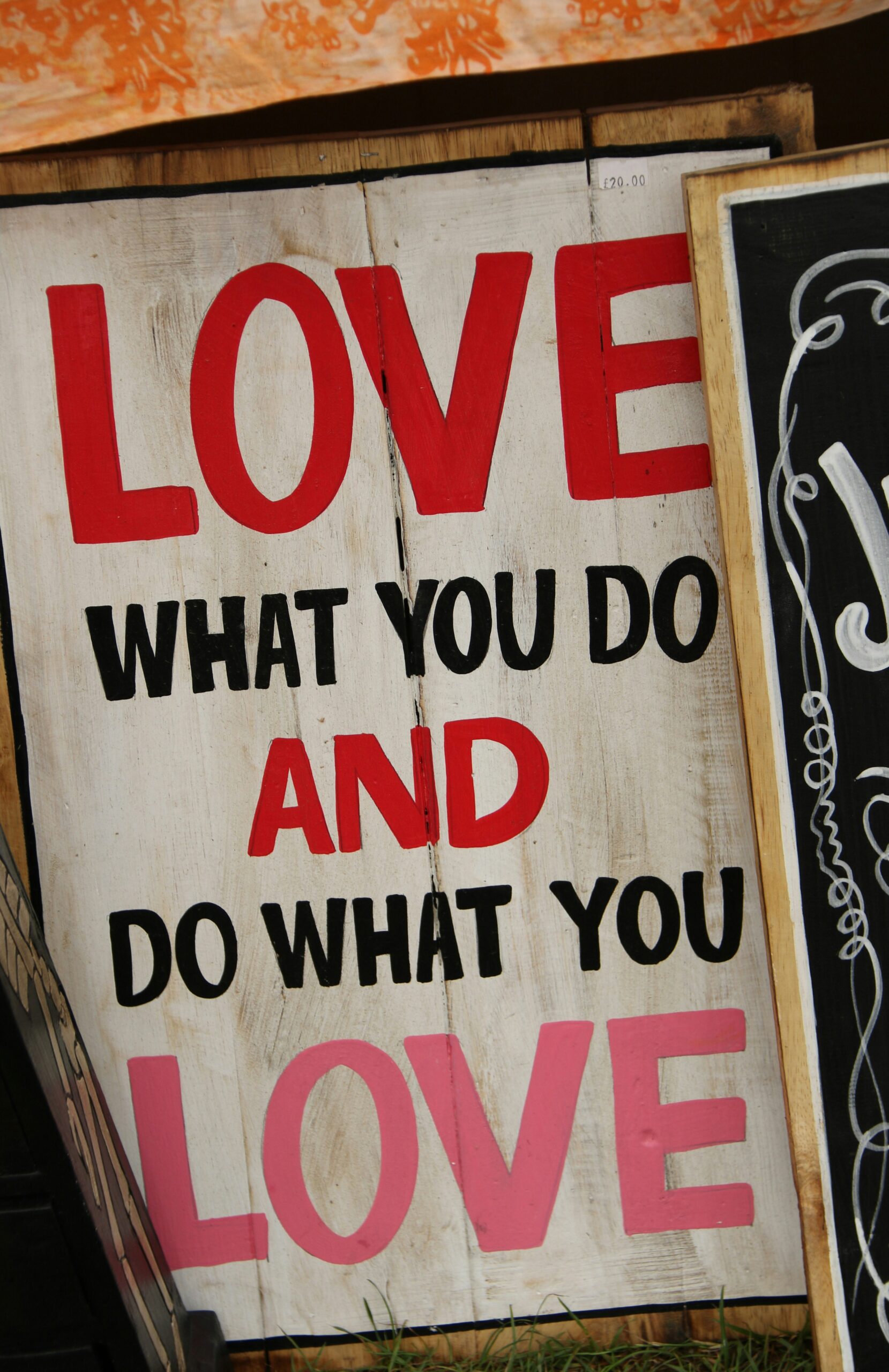 Love what you do and do what you love written on a poster. Photo by Nick Fewings on Unsplash