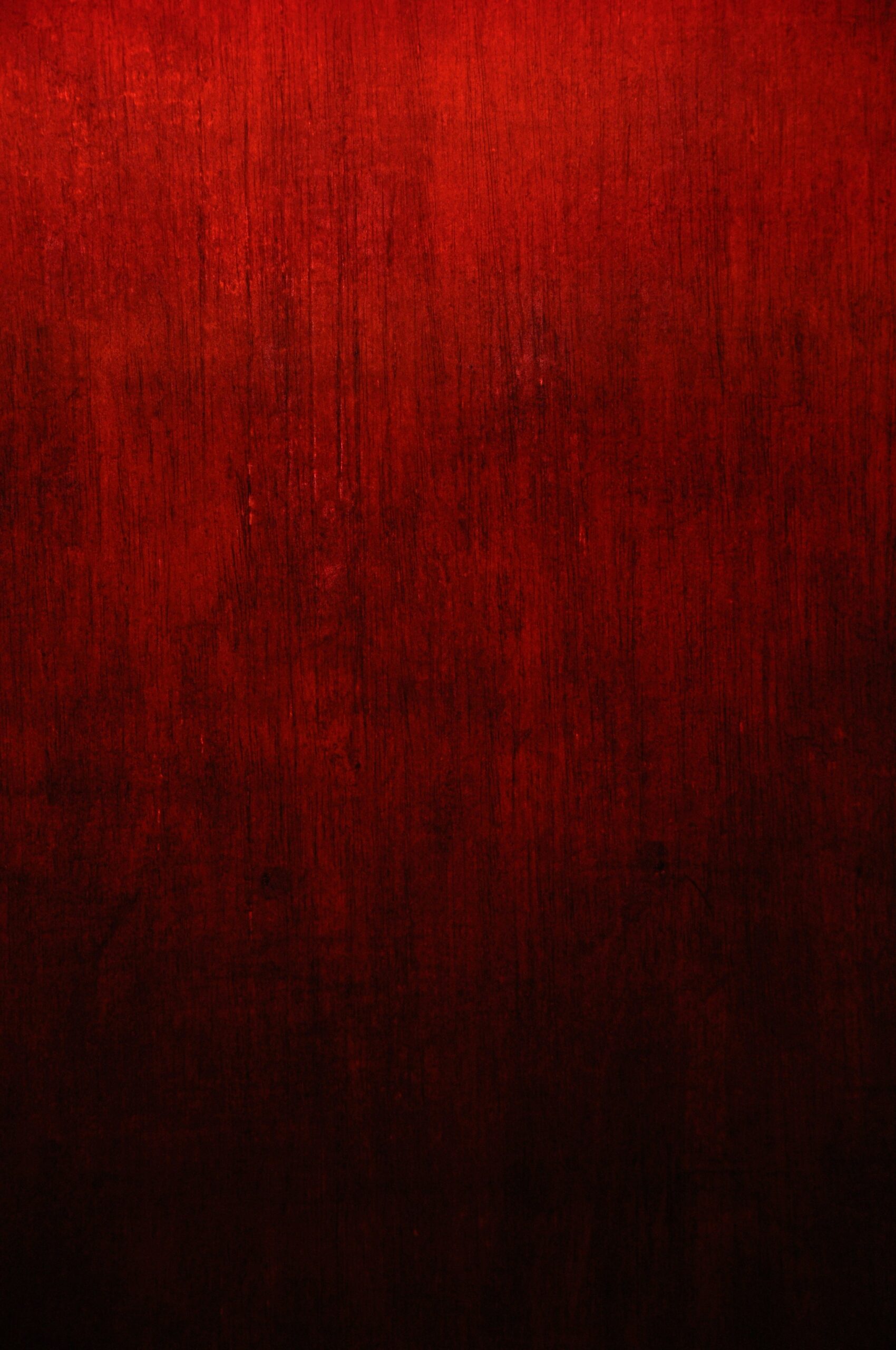 Background photo of a red tapestry with a gradient of colors from red to black. Photo by Bangsal Nam on Unsplash